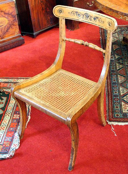 Appraisal: A set of eight Regency yellow-painted dining chairs the bar