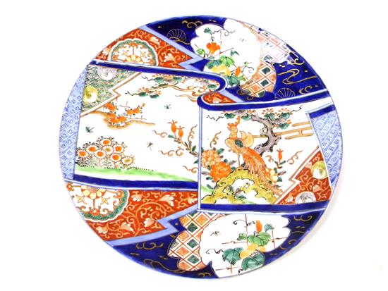 Appraisal: Japanese Imari porcelain charger decorated with central band with landscape