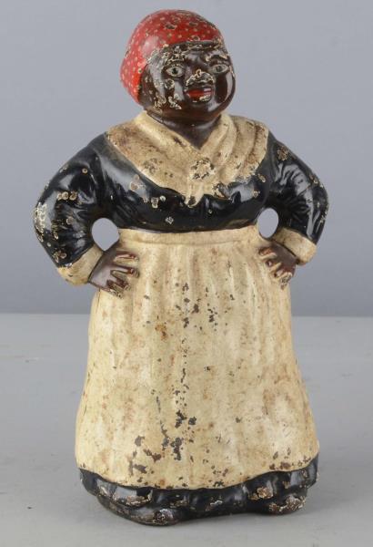 Appraisal: Hubley Cast Iron Mammy Door Stop This figure has a