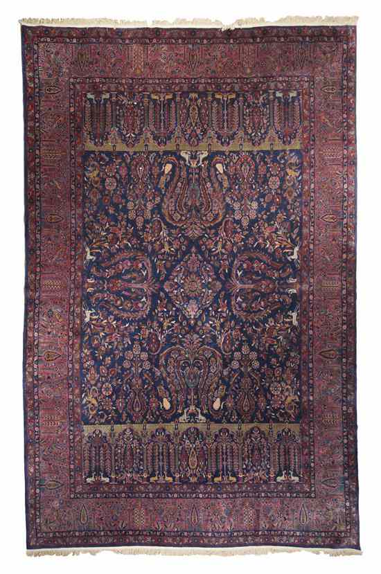 Appraisal: A Kashan Wool Hunt Carpet having repeating stylized foliate and