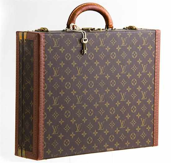 Appraisal: Louis Vuitton Bisten briefcase th century hardsided case with classic