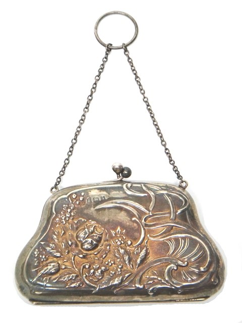 Appraisal: A lady's silver purse decorated with floral foliate and scroll