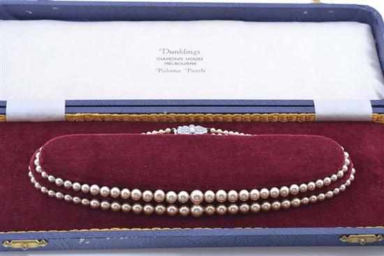 Appraisal: A DOUBLE STRAND OF FAUX PEARLS TO A MARCASITE CLASP