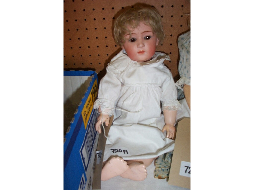 Appraisal: A Simon Hulbig bisque head doll jointed composition body dressed