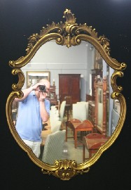 Appraisal: A Louis XV style giltwood wall mirror th century cms