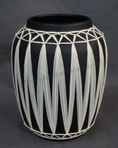 Appraisal: Beautiful construction of matte black art pottery hand decorated with