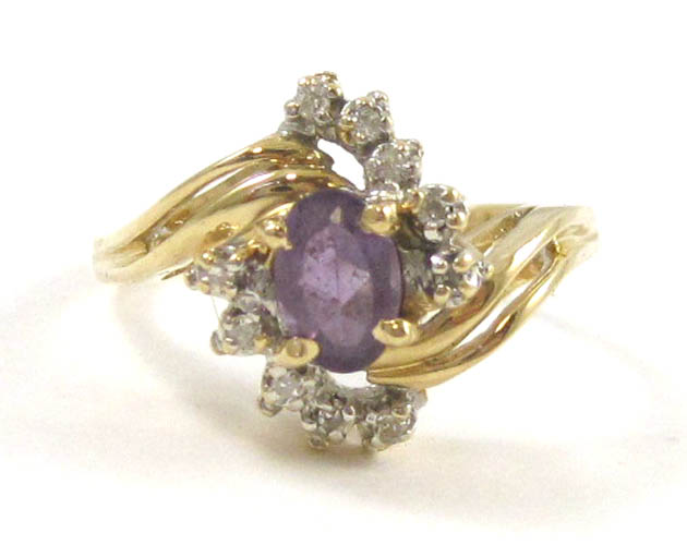 Appraisal: AMETHYST DIAMOND AND FOURTEEN KARAT GOLD RING with ten round-cut