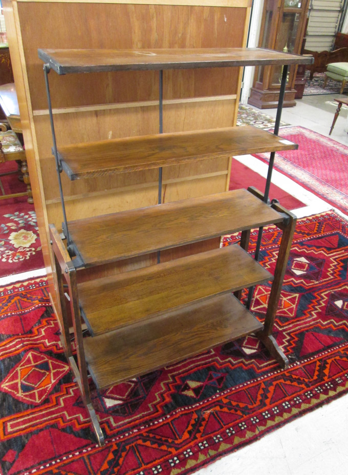 Appraisal: COUNTRY STORE OAK AND CAST IRON COMBINATION DISPLAY RACK TABLE