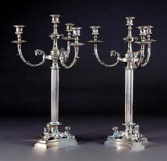 Appraisal: Pair Egyptian Revival silverplate candelabra circa trefoil molded base with