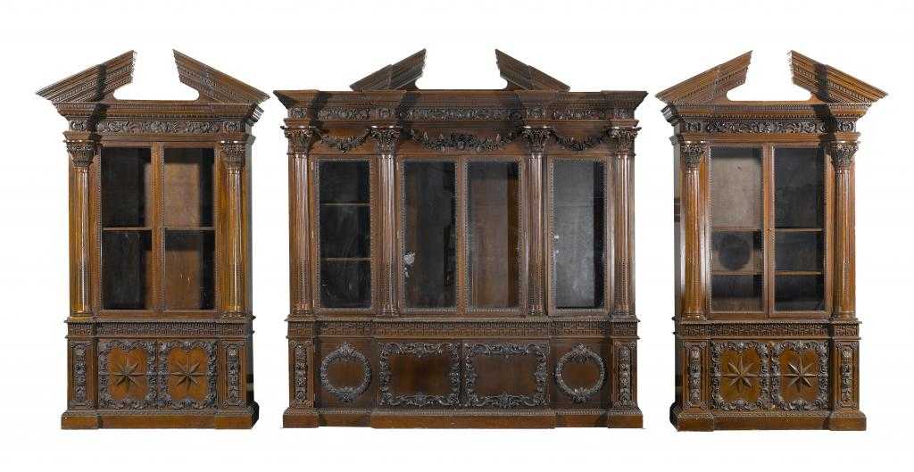 Appraisal: ONE AND A PAIR OF KENTIAN STYLE MAHOGANY BOOKCASES with