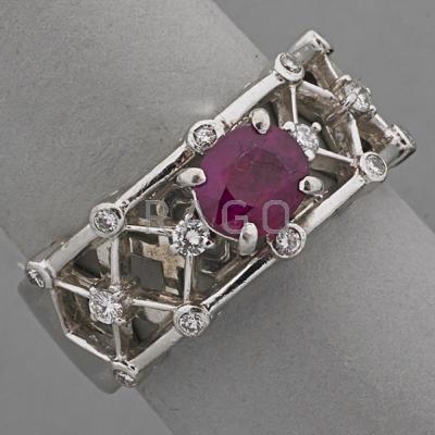 Appraisal: RUBY AND DIAMOND LATTICE PLATINUM RING ca Bright faceted ruby