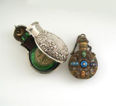 Appraisal: A late Victorian embossed scent bottle case containing a 'CROWN