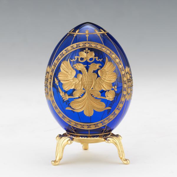 Appraisal: RUSSIAN FABERGE STYLE COBALT BLUE GLASS AND GILT EGG ON