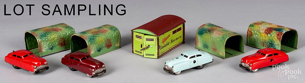 Appraisal: Four Schuco tin windup cars Four Schuco tin windup cars