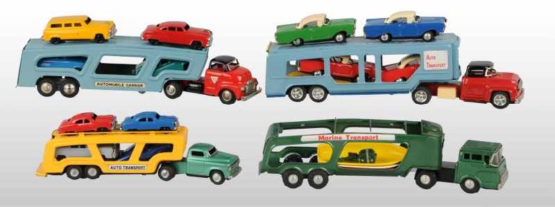 Appraisal: Lot of Tin Litho Transport Truck Friction Toys Description Japanese