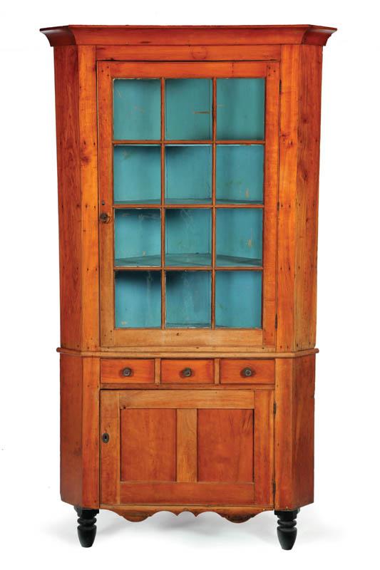 Appraisal: CORNER CUPBOARD American st half- th century cherry and pine