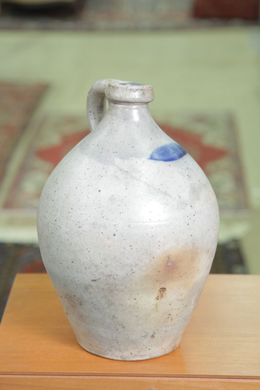 Appraisal: STONEWARE JUG Ovoid form with applied handle and cobalt stripe