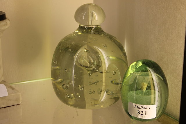 Appraisal: A VICTORIAN GLASS PAPERWEIGHT and a glass doorstop