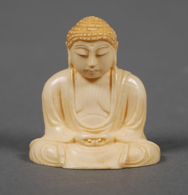 Appraisal: Miniature carving of Buddha believed to be Japanese in origin