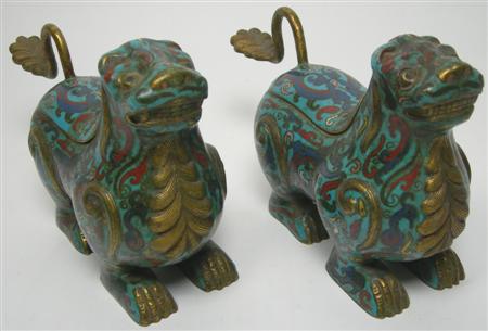 Appraisal: A pair of th th century Chinese cloisonne lion form