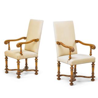 Appraisal: PAIR OF BAROQUE STYLE WALNUT ARMCHAIRS Cream herringbone upholstery on