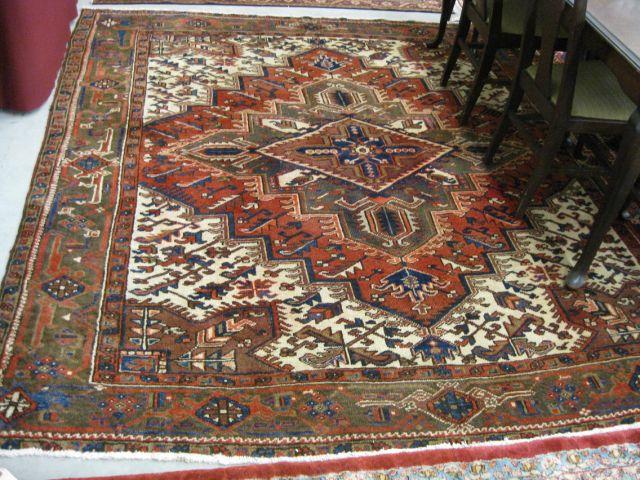 Appraisal: Heriz Persian Handmade Room Size Rug large central medallion fancy