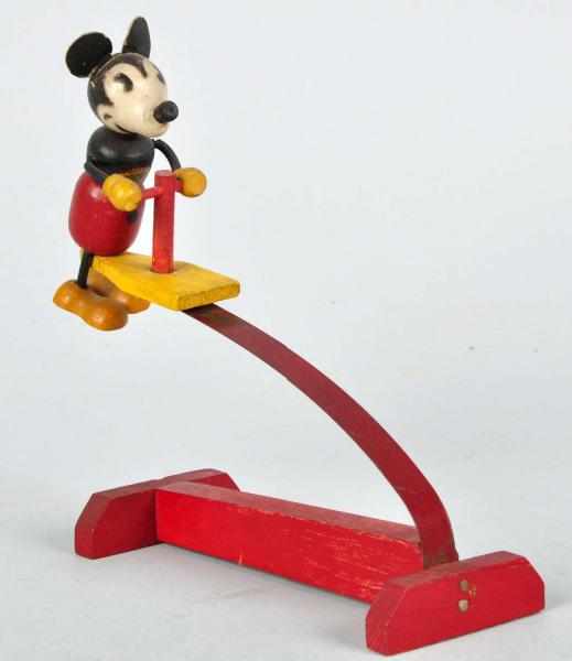 Appraisal: Walt Disney Mickey Fun-E-Flex Bouncing Toy Description Wood and tin