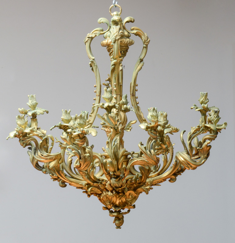 Appraisal: LOUIS XV STYLE GILT-BRONZE SIXTEEN-LIGHT CHANDELIER The pear-form skeleton frame