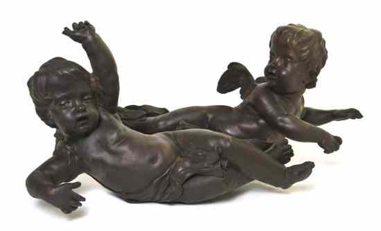 Appraisal: A Pair of Continental Cast Bronze Figural Mounts each depicting