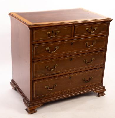 Appraisal: A mahogany chest the top cross banded in maple fitted