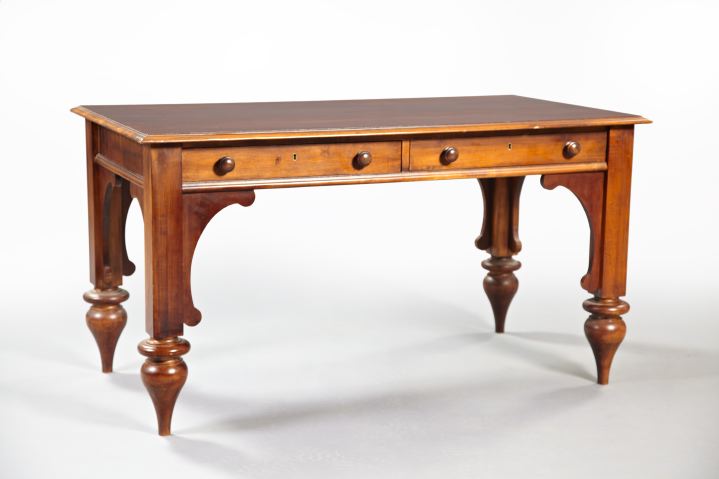 Appraisal: Victorian-Style Stained Mahogany Library Table the overhanging molded top above