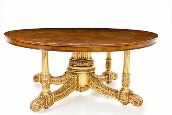 Appraisal: Parcel-gilt walnut center table round banded top and conforming frieze