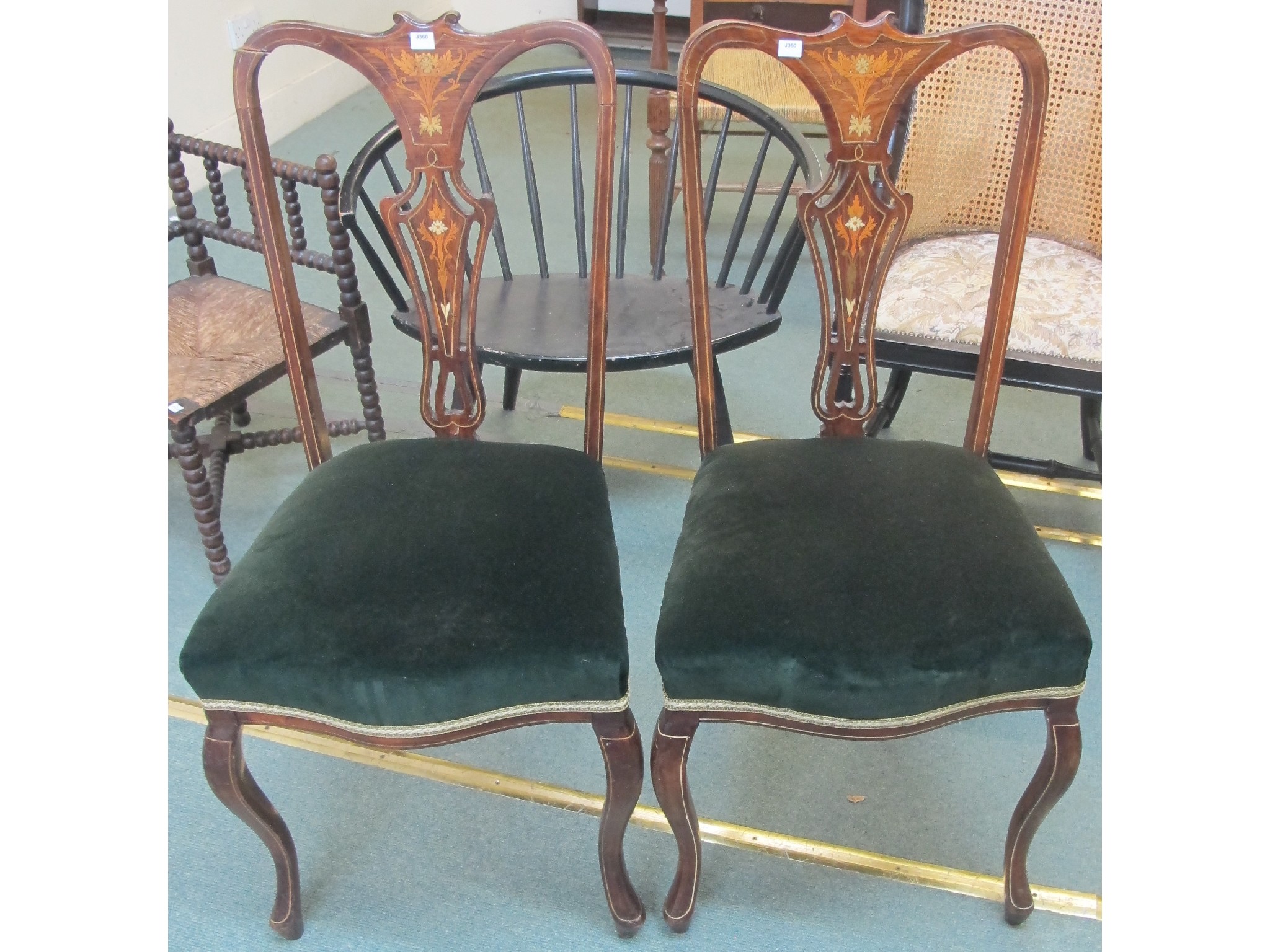 Appraisal: A pair of Edwardian mahogany floral inlaid parlour chairs