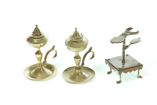 Appraisal: THREE BRASS LIGHTING DEVICES American or English th century Two