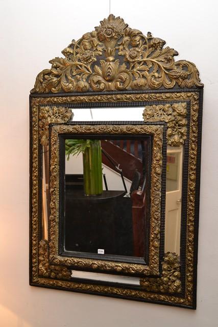 Appraisal: A TH CENTURY REPOSE PRESSED BRASS MIRROR