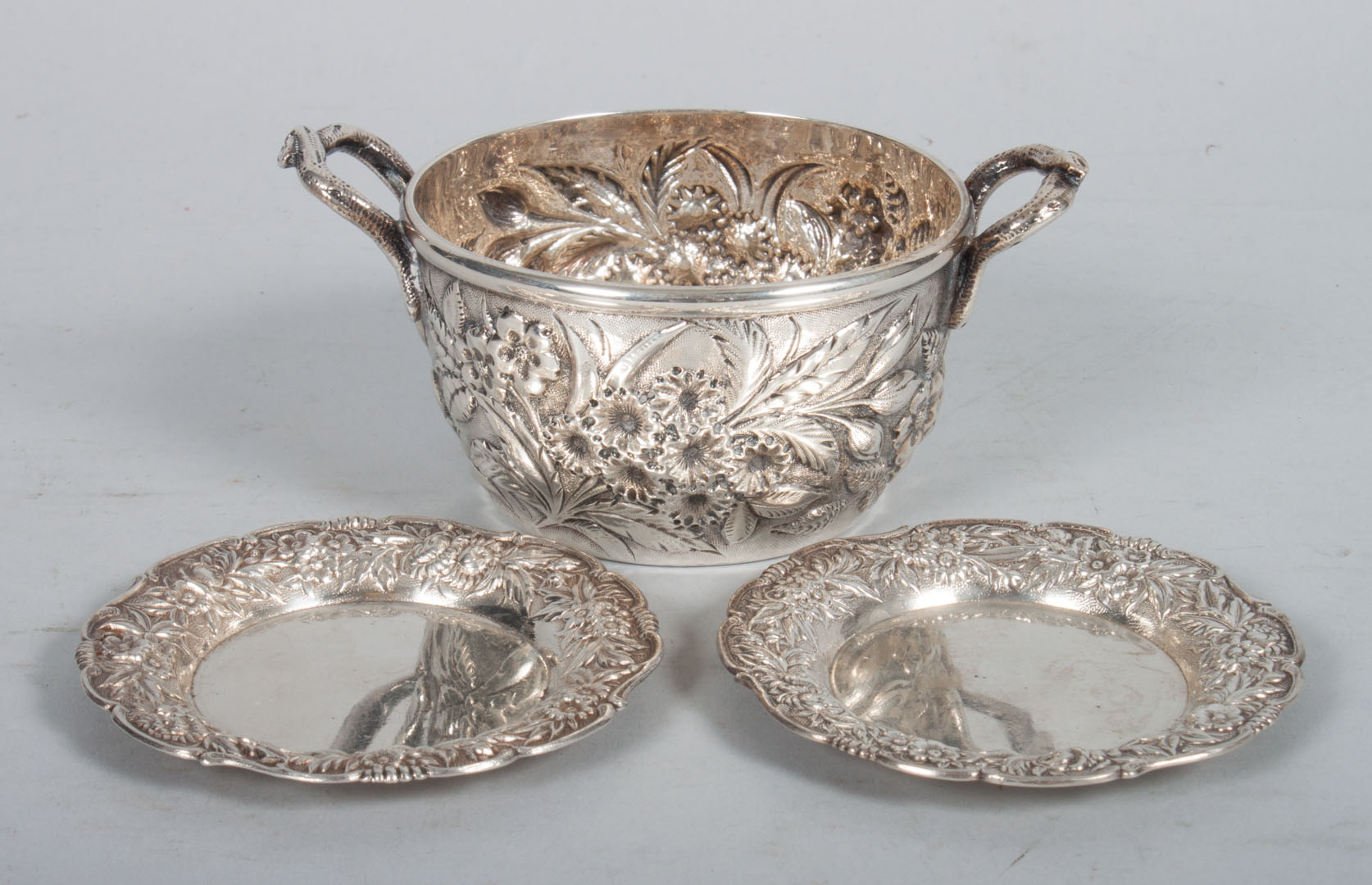 Appraisal: Kirk repousse sterling sugar bowl nut dishes open sugar bowl