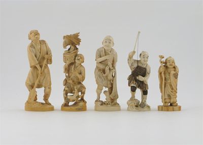 Appraisal: Five Japanese ivory carvings of figures one holding a staff