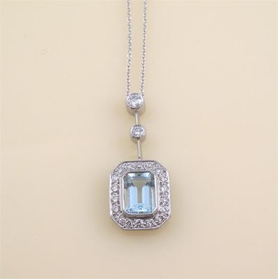 Appraisal: An aquamarine and diamond pendant the rectangular aquamarine is set