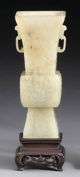 Appraisal: A small nephrite beaker vase Of rectangular section with a