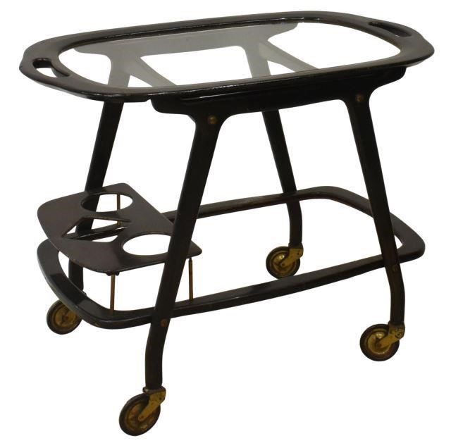 Appraisal: Italian mid-century modern service cart c s oval glass top