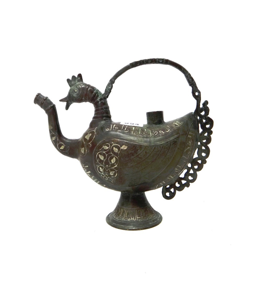 Appraisal: A bronze zoomorphic vessel possibly Khorasan in the form of