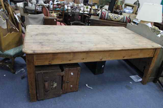 Appraisal: A LARGE VICTORIAN RECTANGULAR PINE KITCHEN TABLE with two frieze