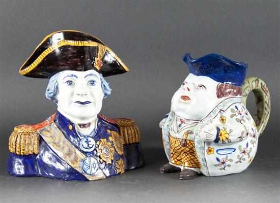 Appraisal: French faience toby jug of portly man and a similar