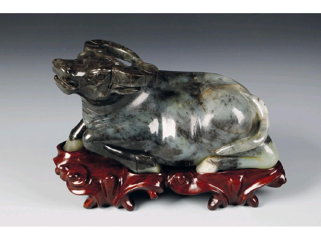 Appraisal: A MASSIVE CHINESE JADE BUFFALO with head slightly raised the