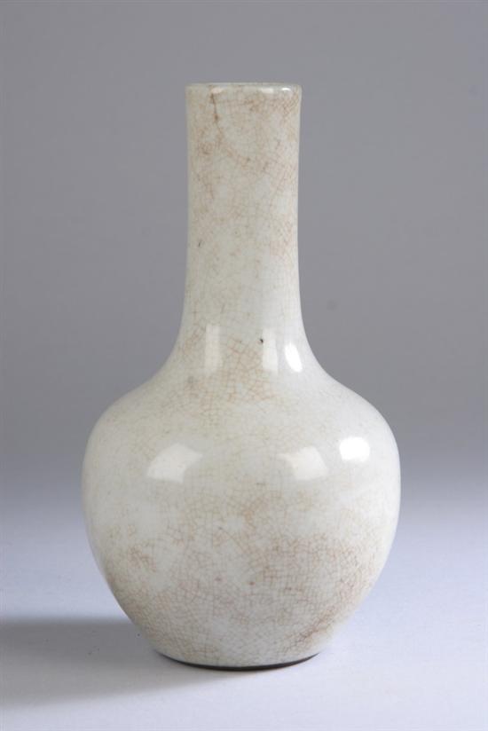 Appraisal: CHINESE MONOCHROME BEIGE CRACKLED GLAZE PORCELAIN BOTTLE VASE Qing dynasty