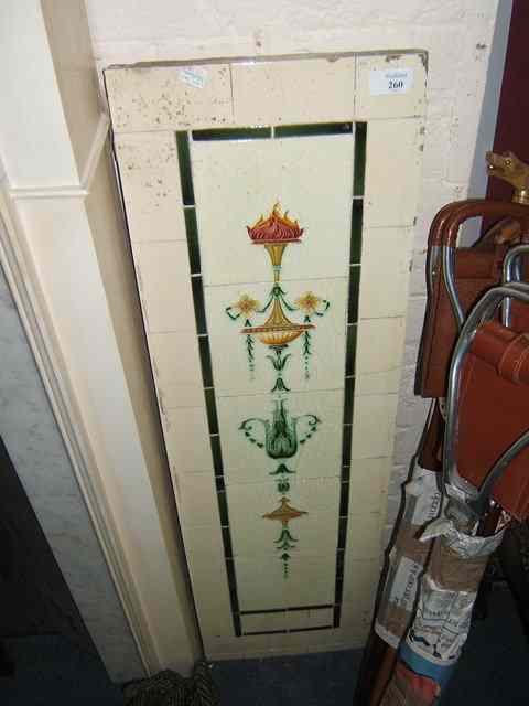 Appraisal: A PAIR OF TILED ADAM STYLE FIREPLACE ELEMENTS classical urn