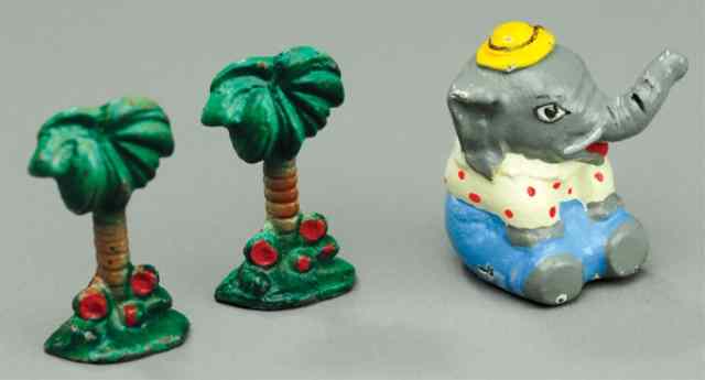 Appraisal: HUBLEY CIRCUS ELEPHANT AND PALM TREE PAPER WEIGHTS Cast very