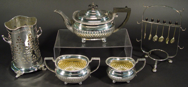 Appraisal: Three piece silver plated tea service together with a pierced