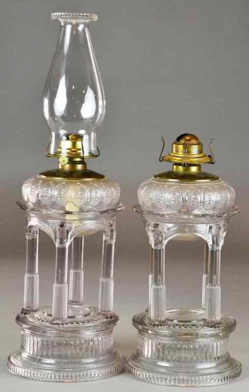 Appraisal: Pr American Pressed Glass Portico Oil LampsWith burners marked for