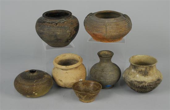 Appraisal: SEVEN ARCHAIC STYLE EARTHENWARE POTTERY VESSELS height of tallest inches